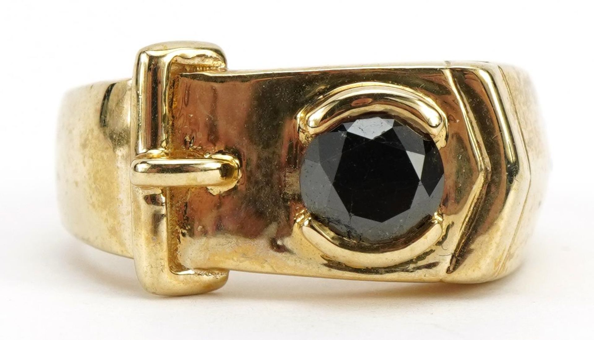 9ct gold buckle ring set with a hematite, size S/T, 8.0g