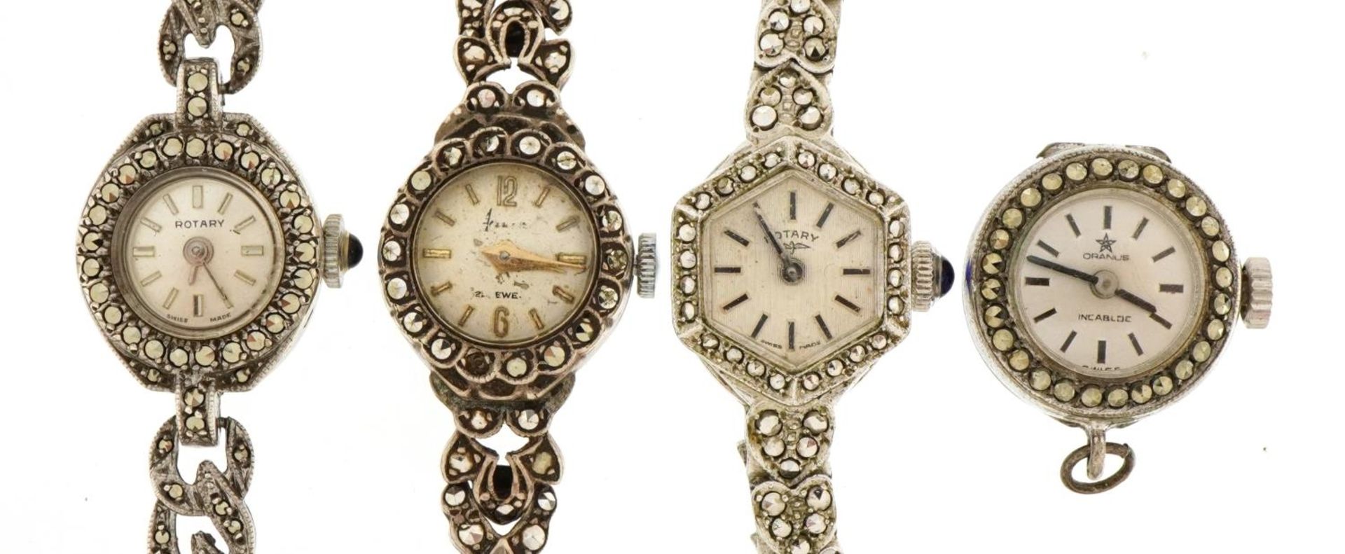 Four vintage and later ladies silver and white metal marcasite wristwatches including Rotary and