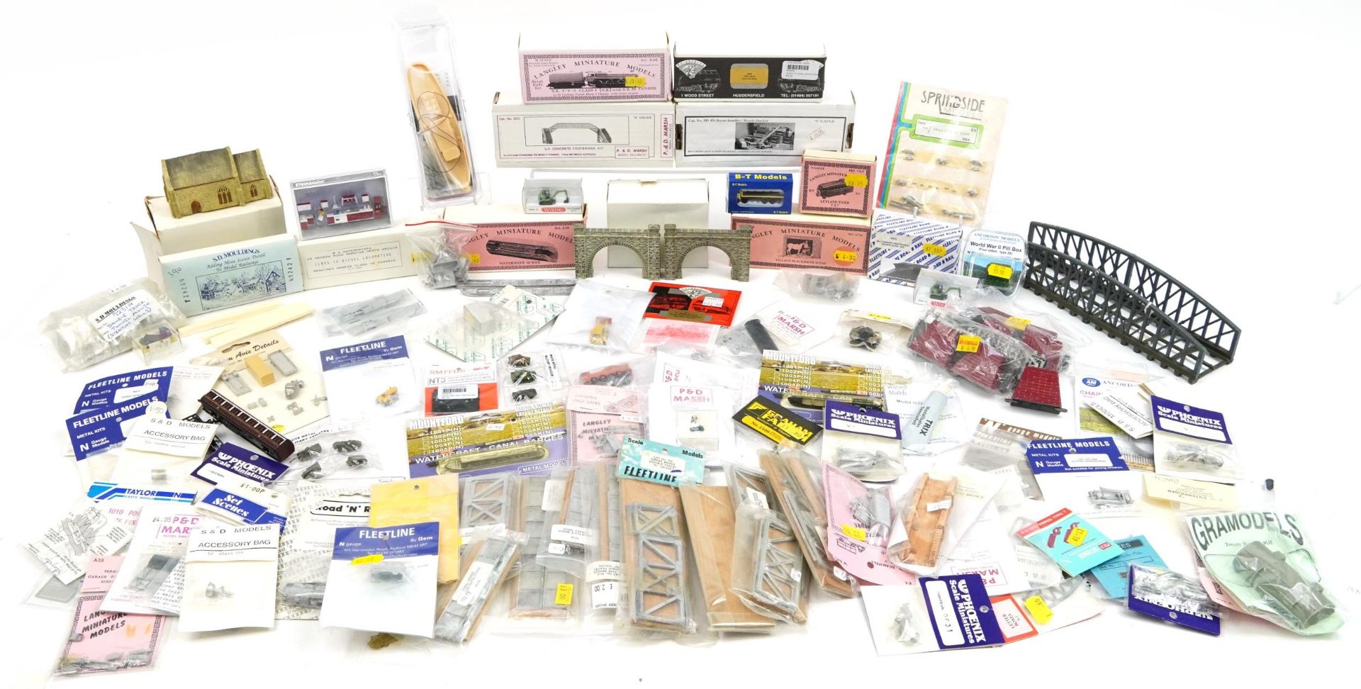 Large collection of N gauge model railway trackside accessories including Langley miniature