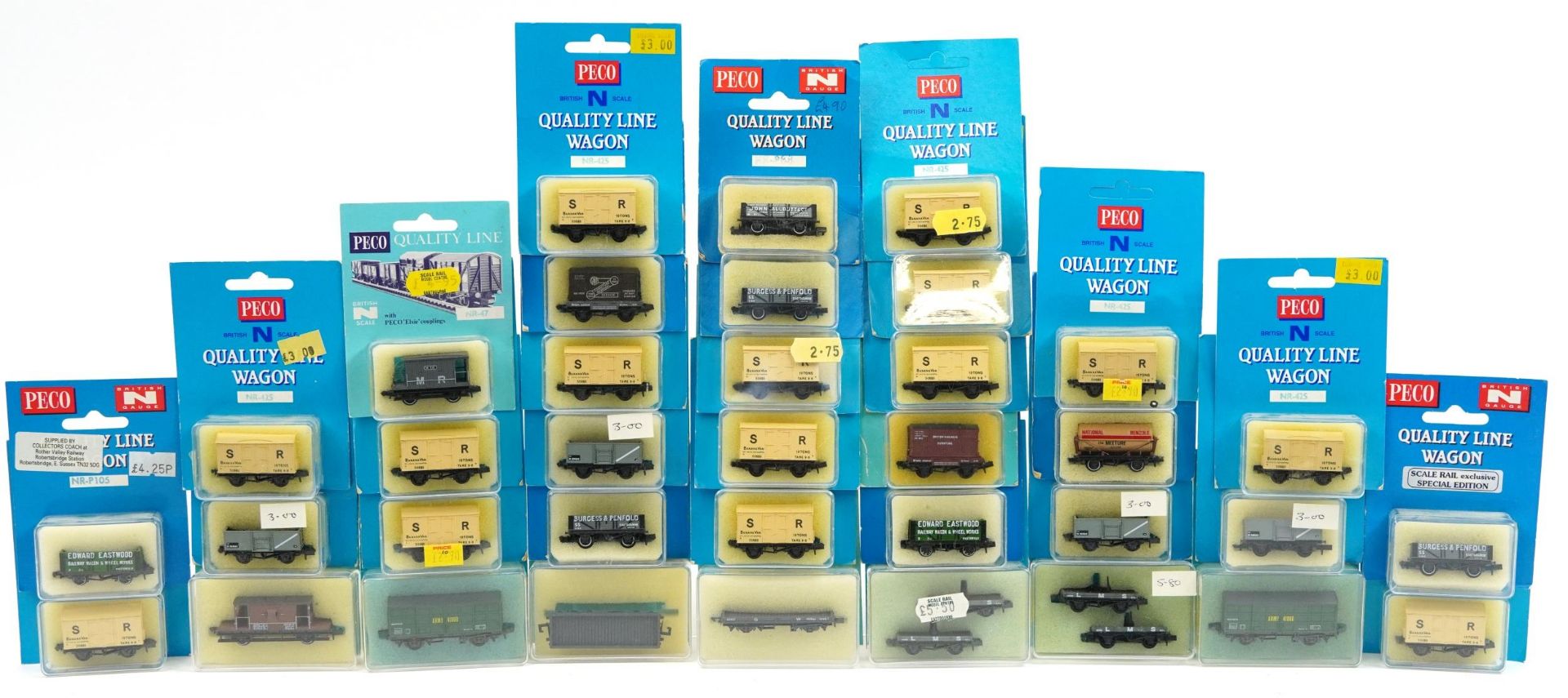 Thirty two Peco N gauge model railway wagons and tankers with cases