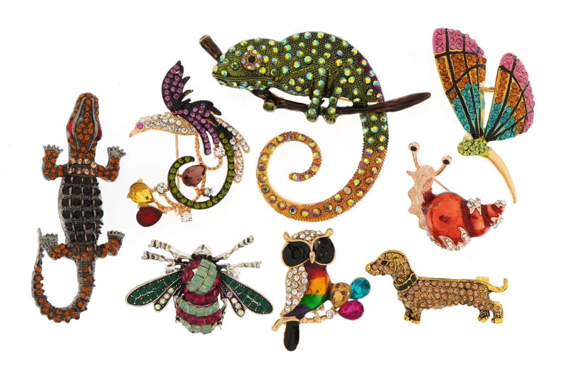 Eight jewelled and enamel animal and insect brooches including Dachshund, butterfly and crocodile,