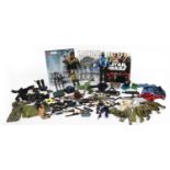 Collection of vintage and later Action Man figures with accessories and three Star Wars annuals