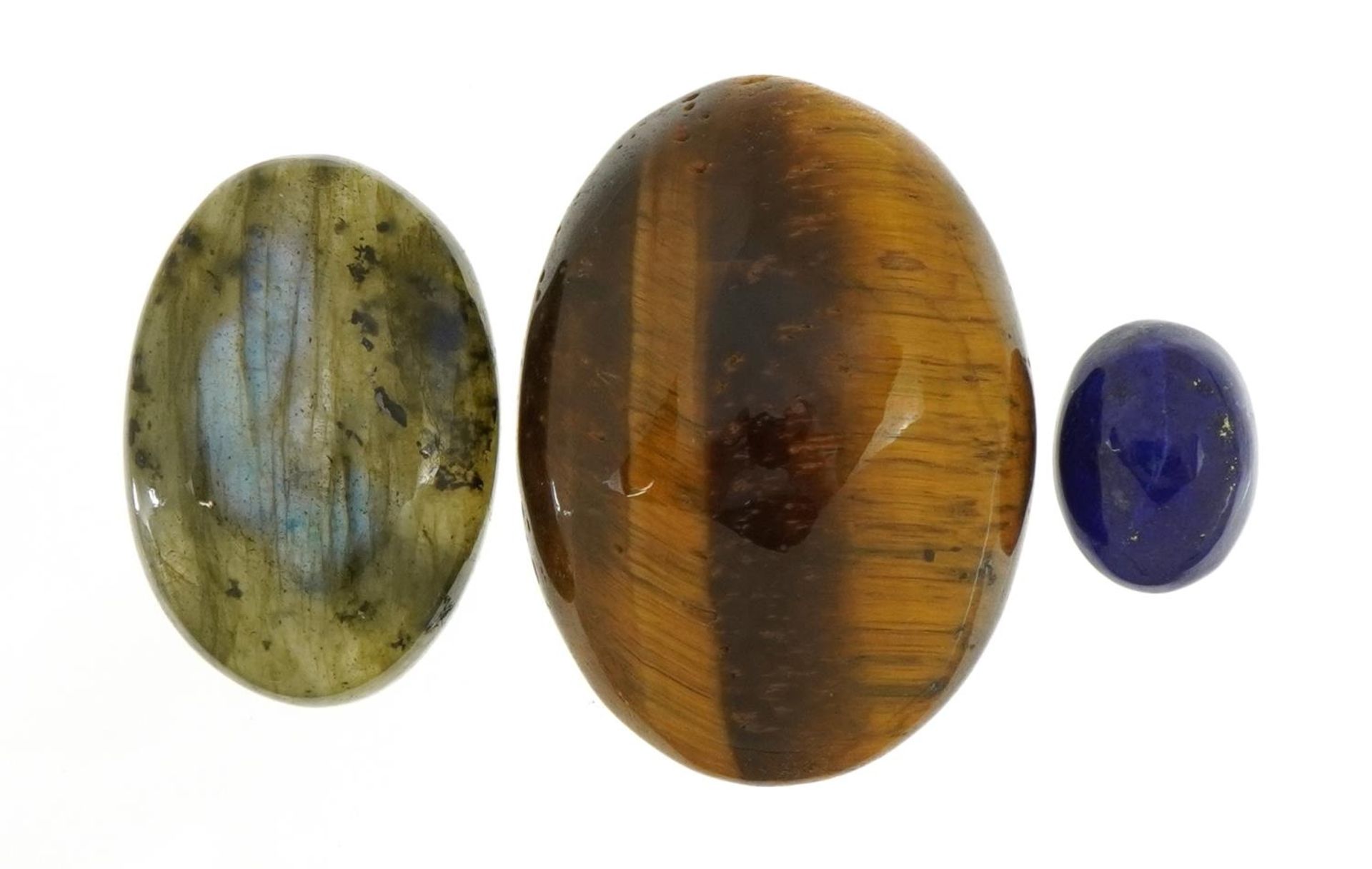 Three gemstones with certificates comprising tiger's eye 57.75 carat, labradorite 27.39 carat and