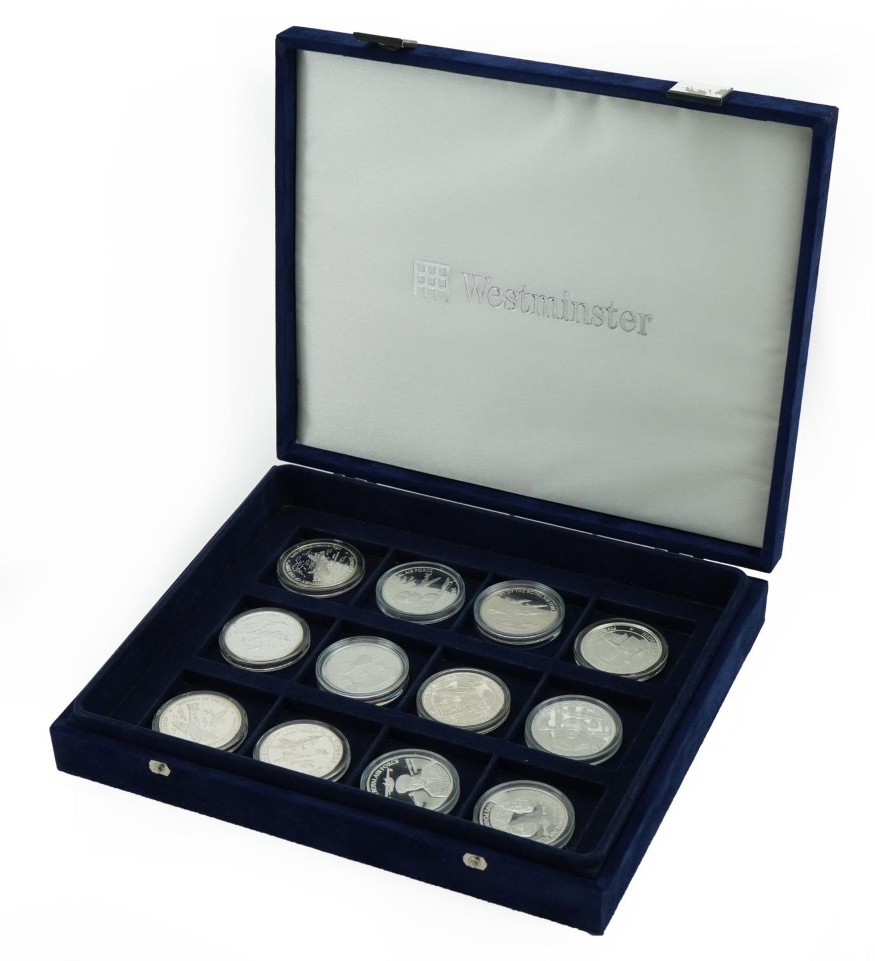 Twelve silver commemorative limited edition History of The RAF five pound coins and five dollar