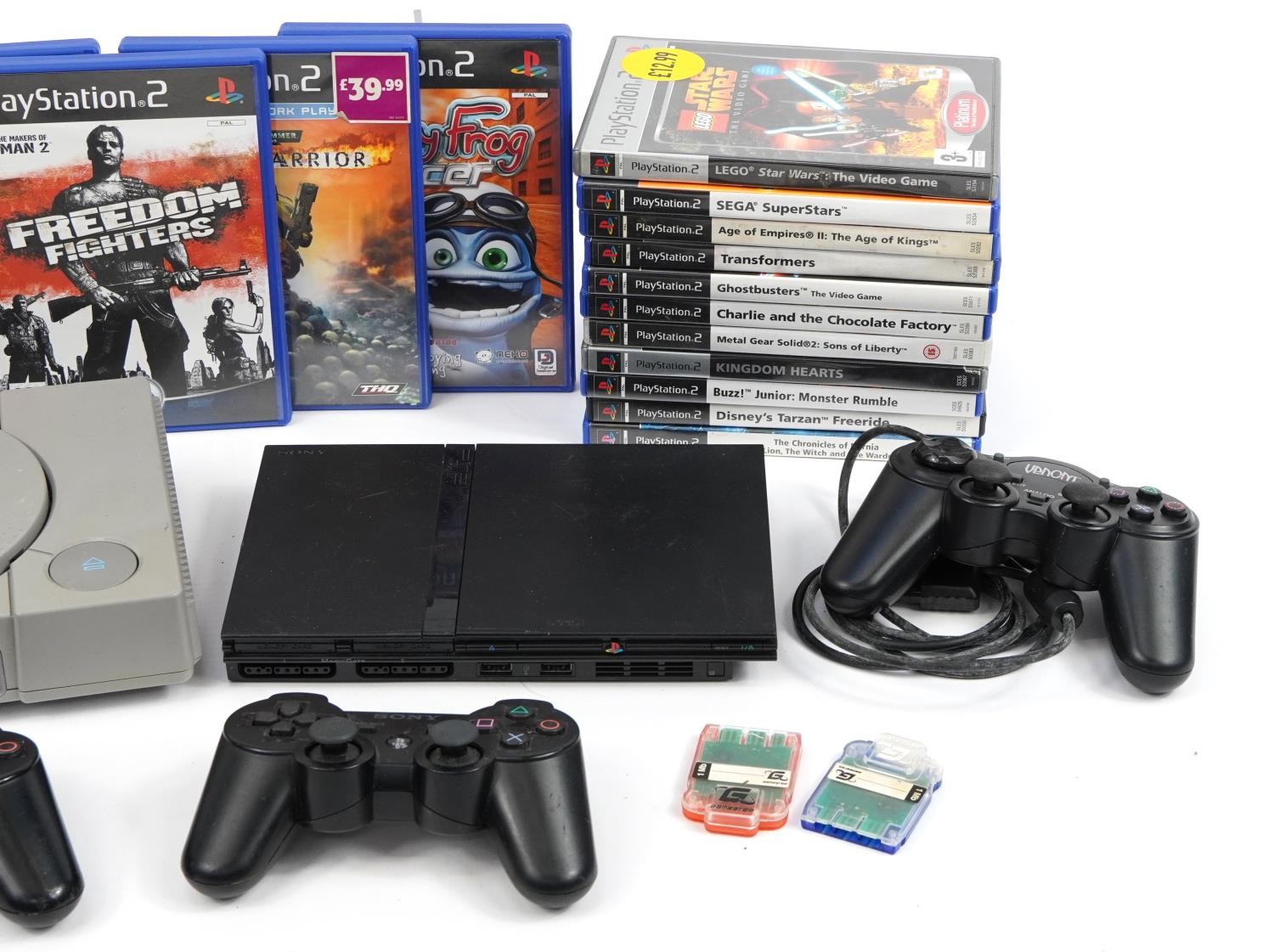 PlayStation 1 and PlayStation 2 Slimline games consoles with controllers and a collection of games - Image 3 of 3