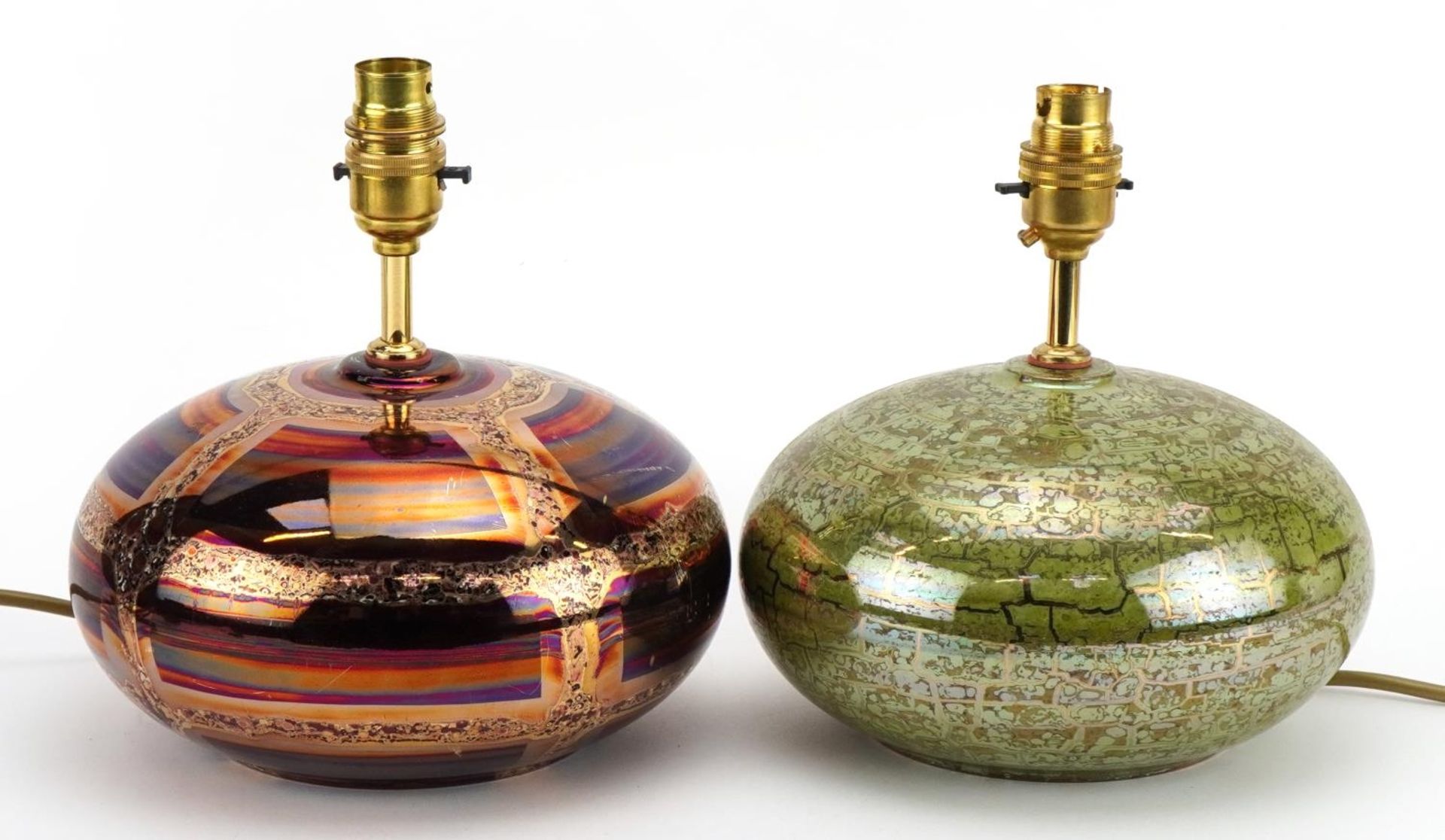 Atkinson Jones, two contemporary lustreware table lamps having red and green glazes, each 22.5cm