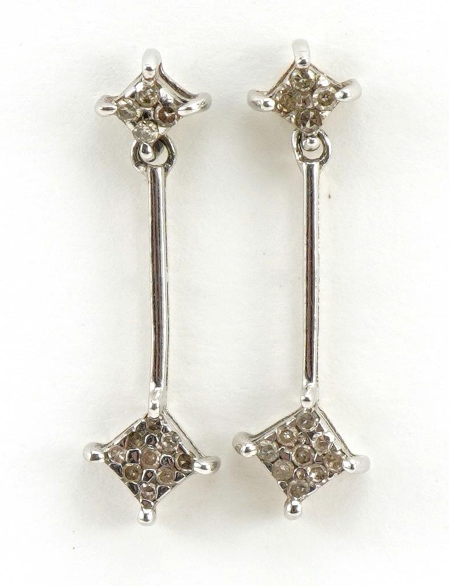 Pair of unmarked white gold diamond cluster drop earrings, 2.5cm high, 1.4g