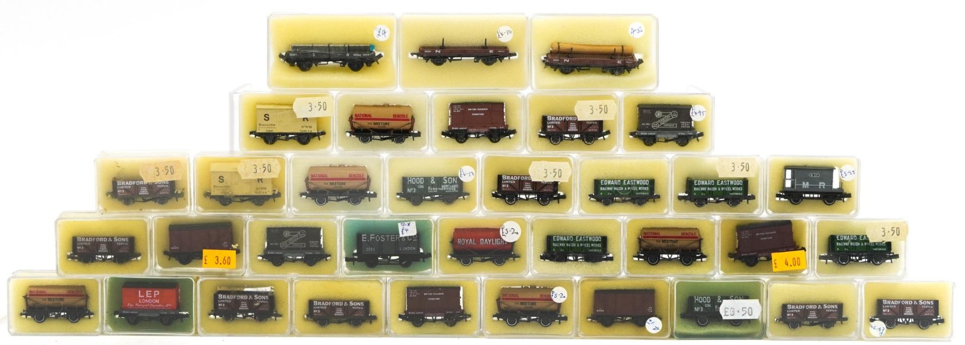 Thirty five Peco N gauge model railway wagons and tankers with cases