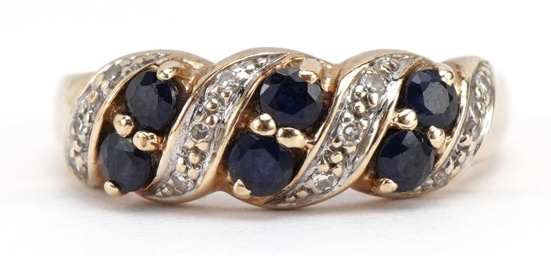 9ct gold sapphire and diamond crossover ring, size N, 2.6g