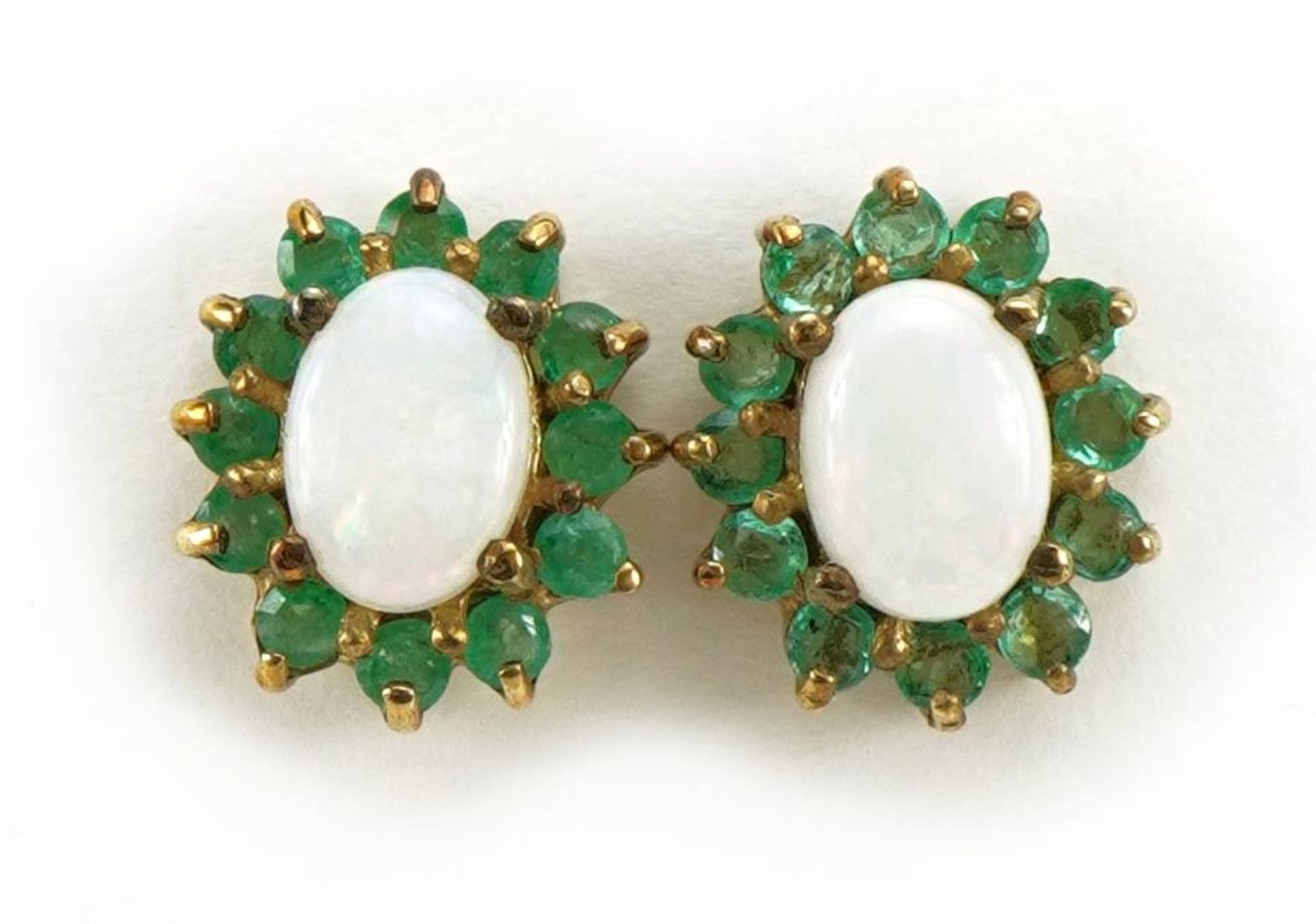 Pair of 9ct gold opal and emerald cluster stud earrings, 1.2cm high, 2.0g