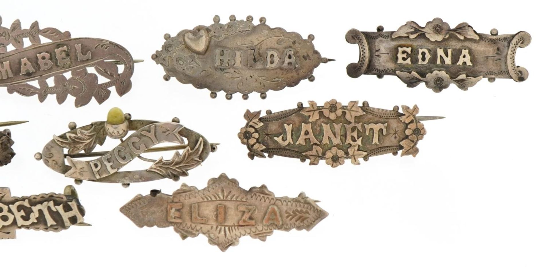 Nine Victorian silver name brooches including Mabel, Eliza and Hilda, the largest 4.3cm wide, - Image 3 of 5