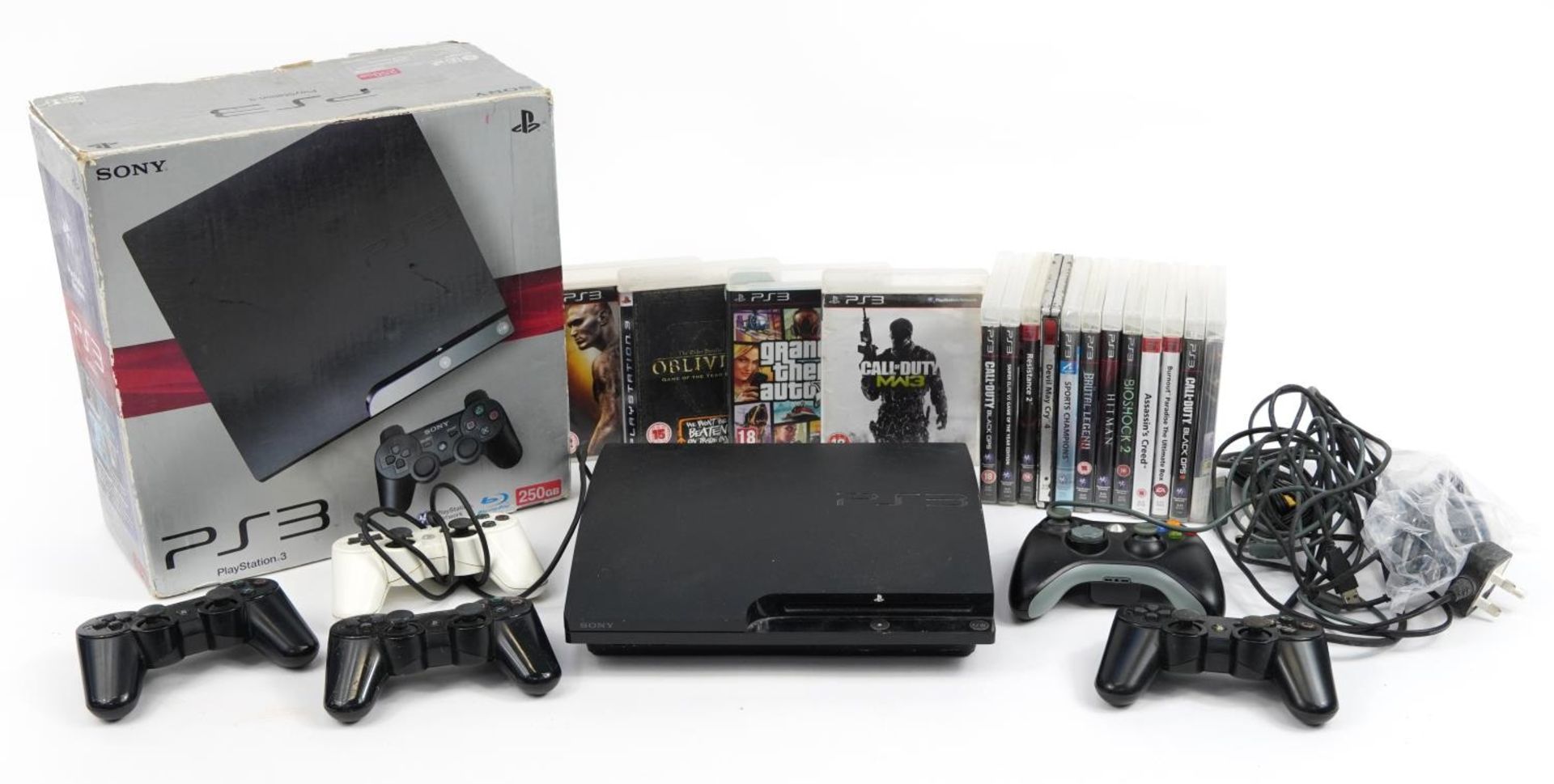 PlayStation 3 games console with box and a collection of games