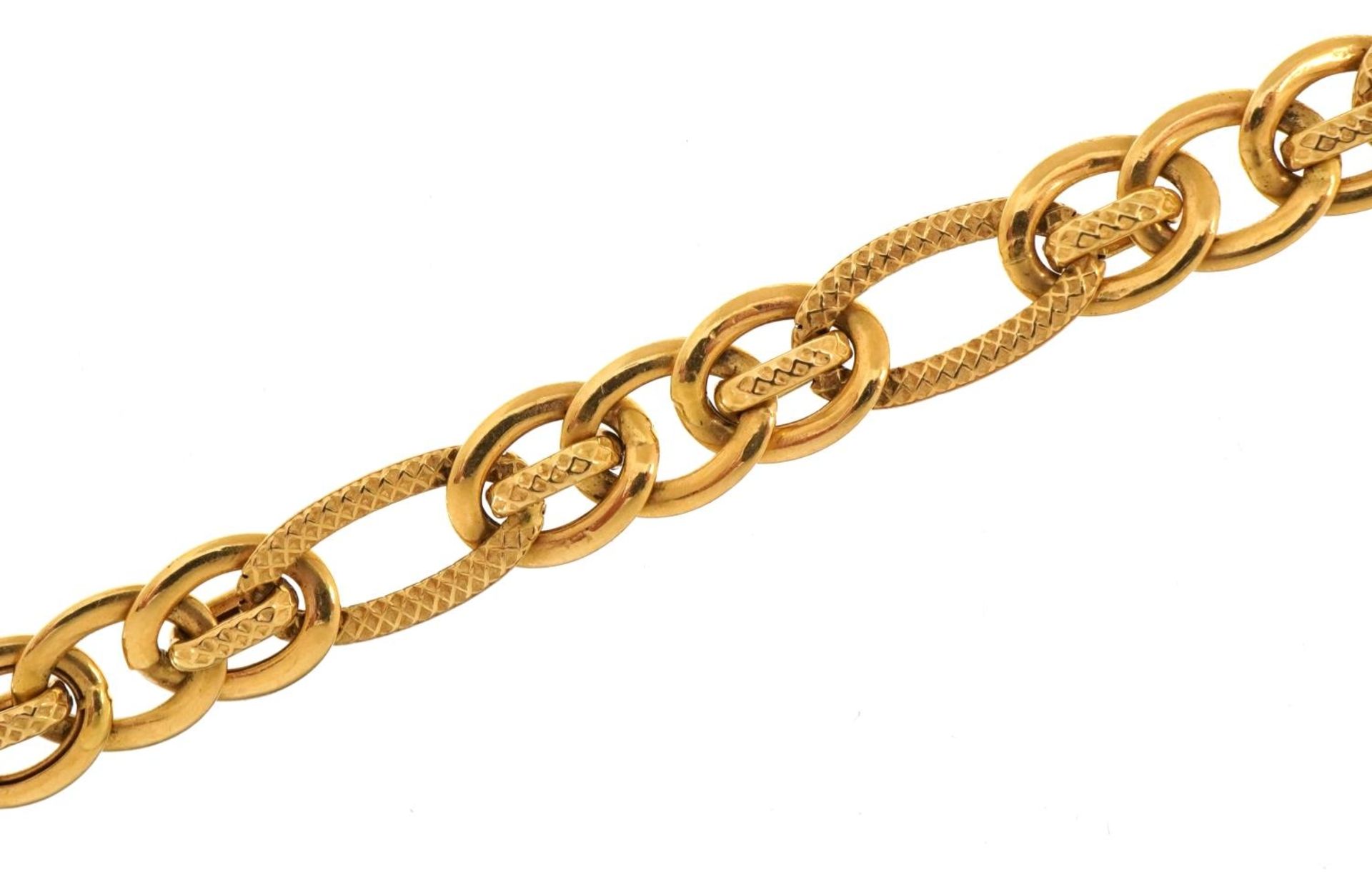 18ct gold multilink bracelet, 19.5cm in length, 6.2g