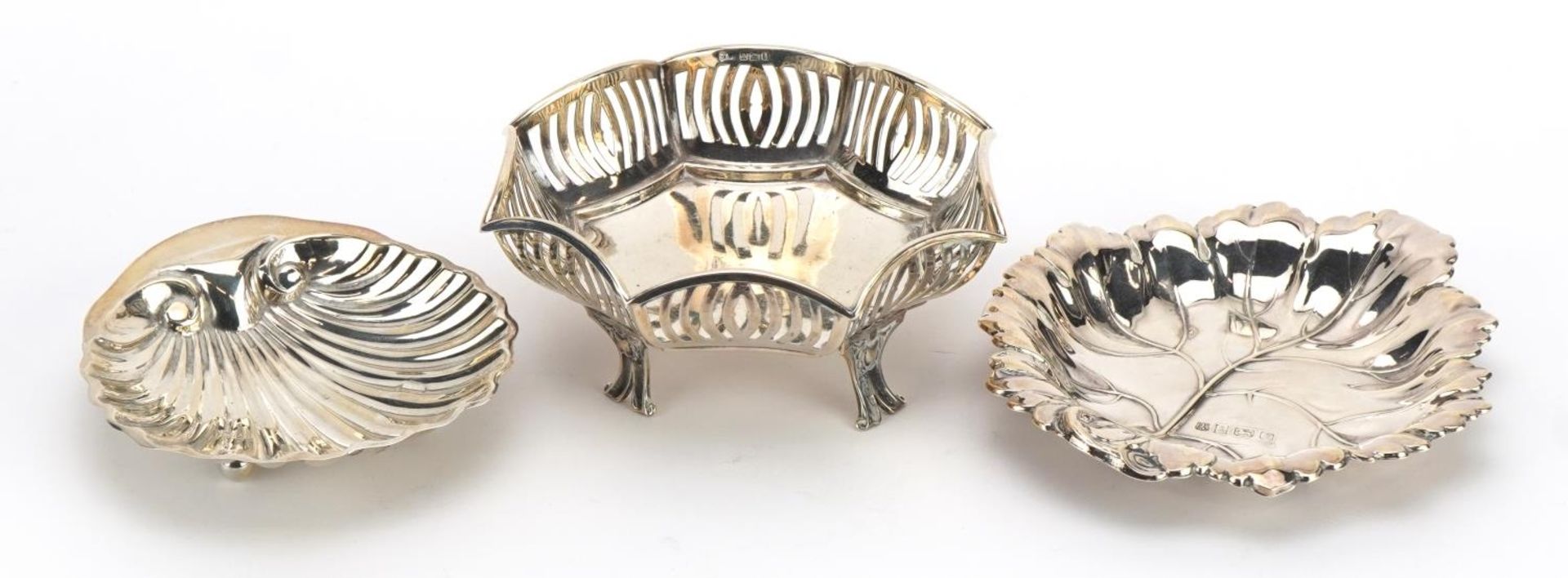 Silver items comprising pierced bonbon dish and two other dishes, one in the form of a leaf, various