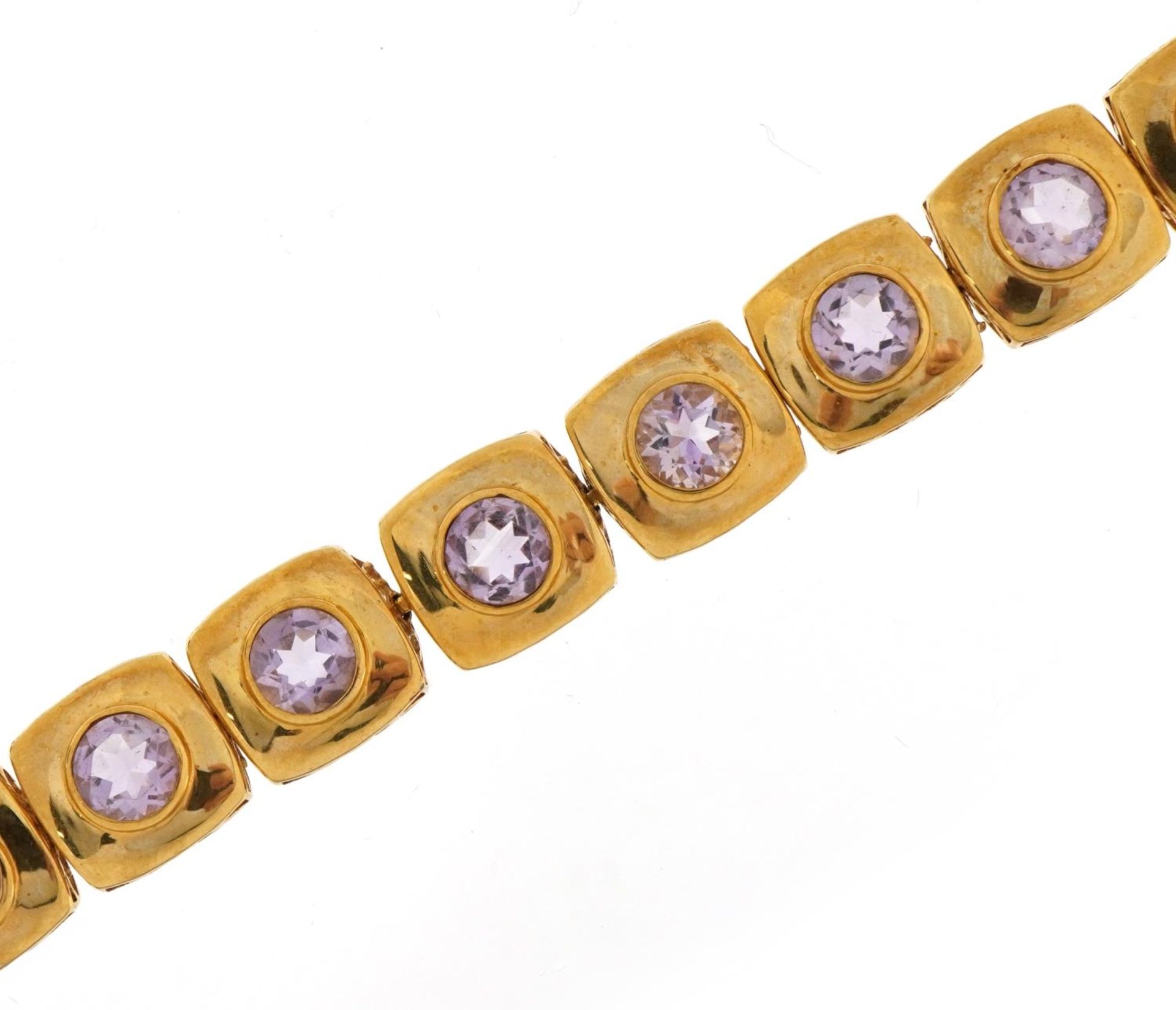 9ct gold bracelet set with pink stones, 19cm in length, 23.4g