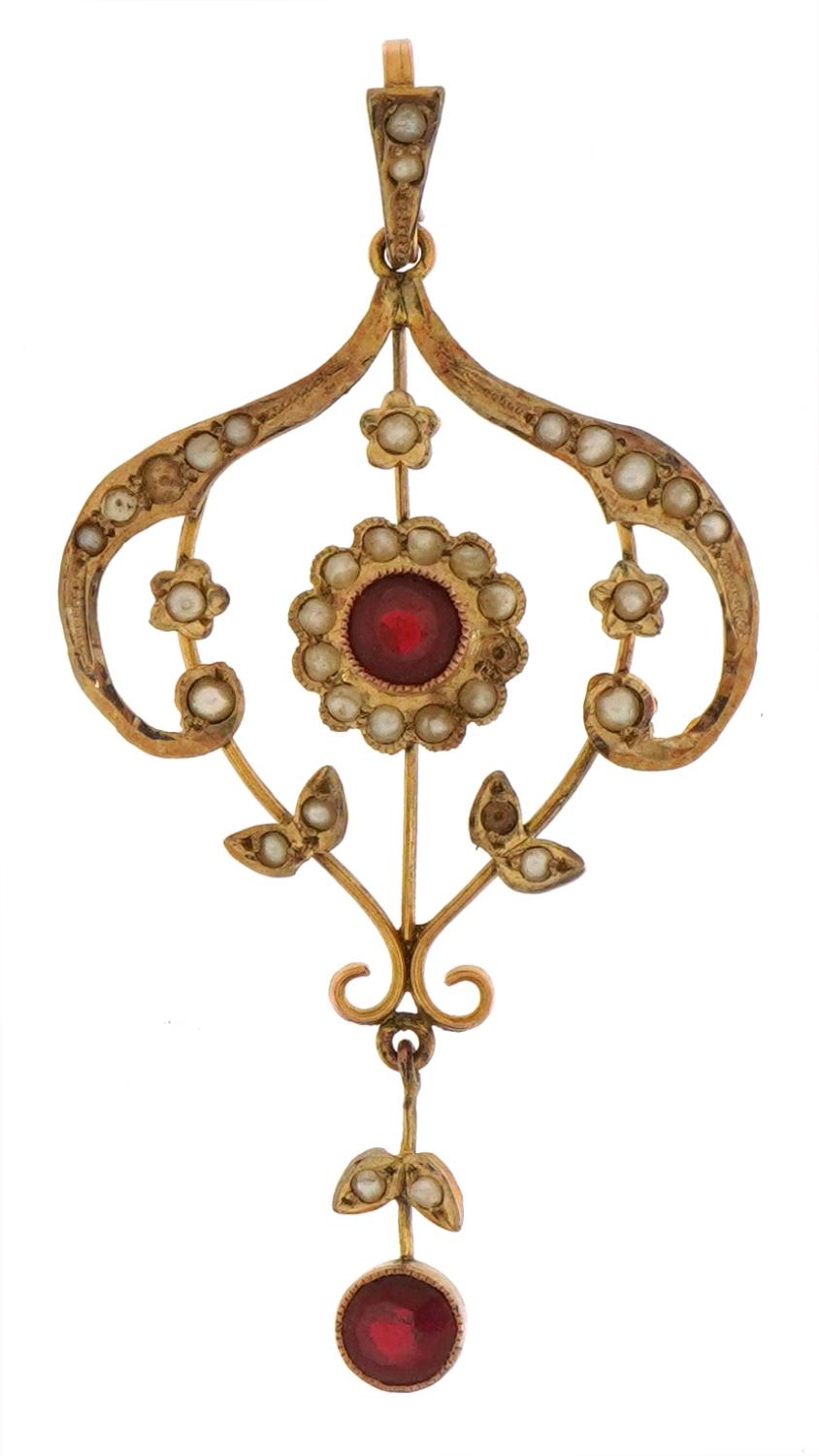 Edwardian 9ct gold seed pearl and red stone drop pendant, 5.8cm high, 3.0g