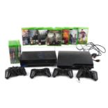 PlayStation 2 and PlayStation 3 games consoles with controllers and a collection of Xbox One games