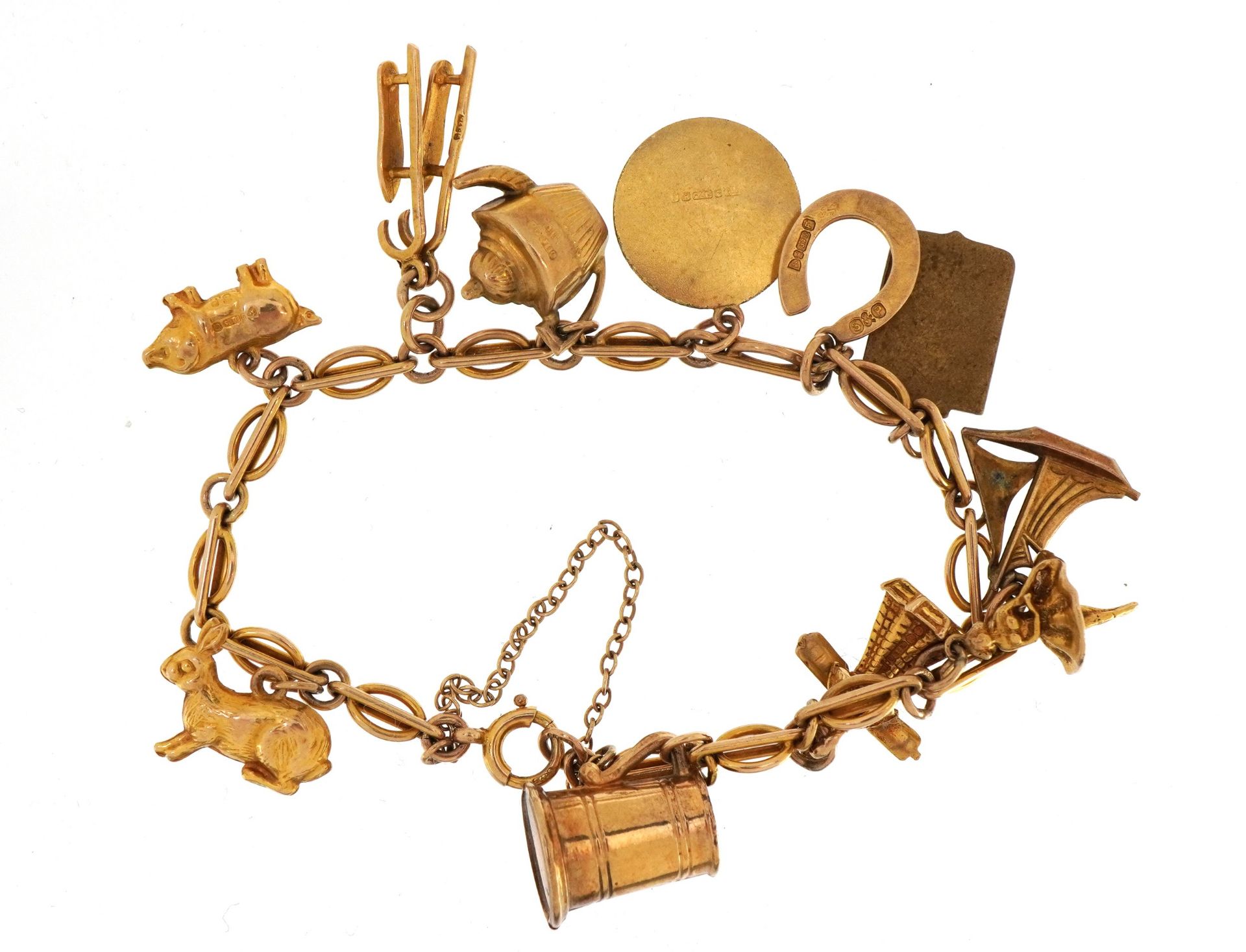 9ct gold charm bracelet with a selection of mostly gold charms, including ballerina, horseshoe and i - Image 2 of 3