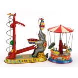 Two German vintage tinplate toys including a West Germany carousel and an Altes Nürnberger