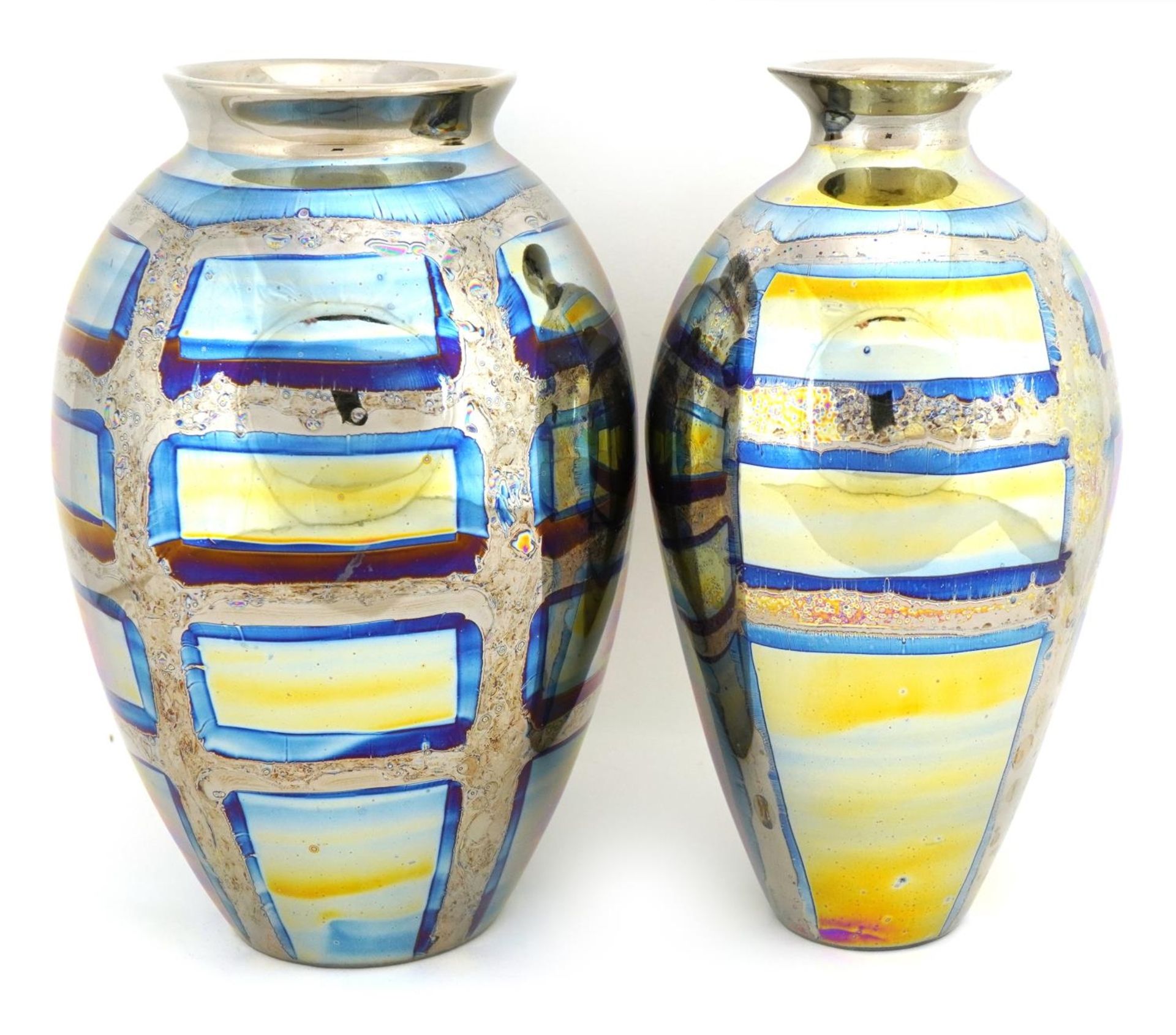 Atkinson Jones, two contemporary lustreware vases having silvered block design glazes, each 16.5cm