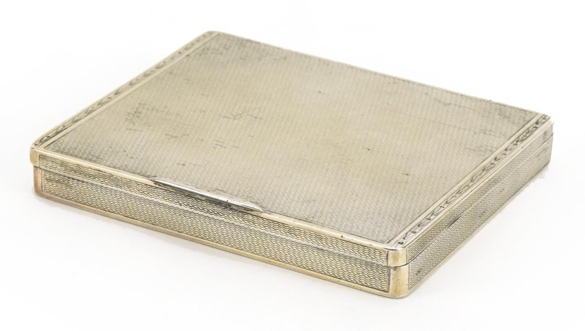 William Base & Sons, George V rectangular silver cigarette case with engine turned decoration and