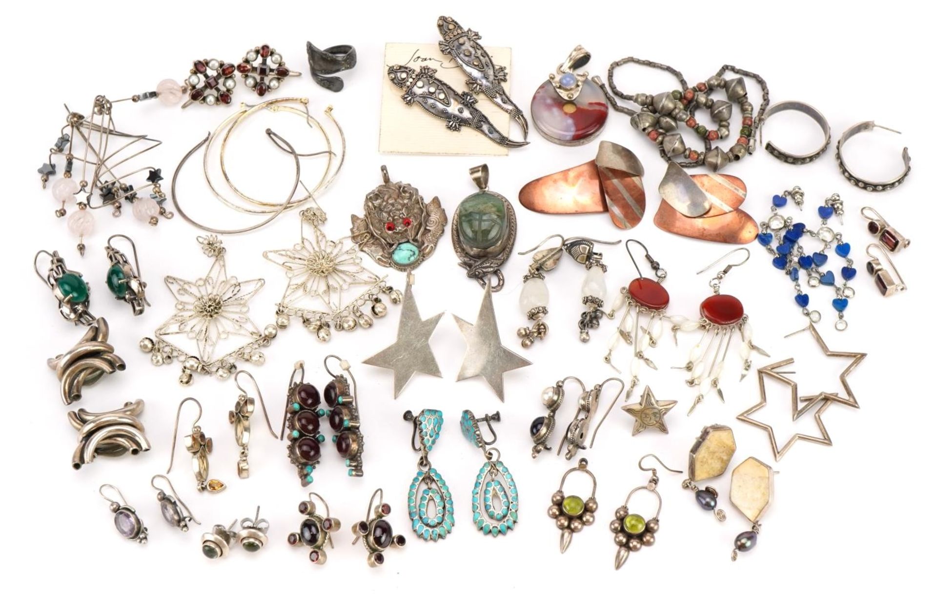 Silver and white jewellery including necklaces, earrings and pendants, some set with semi precious