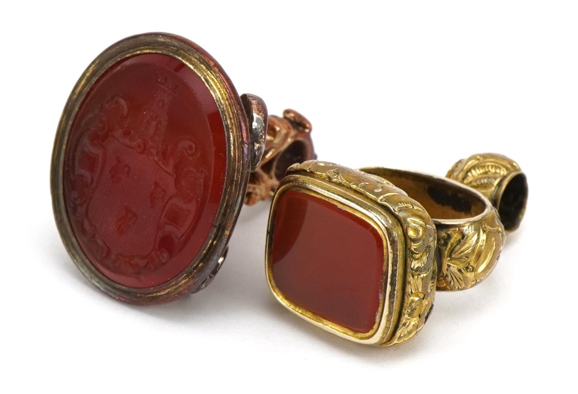 Two antique yellow metal carnelian seal fobs including one carved with a heraldic crest, the largest - Image 3 of 4