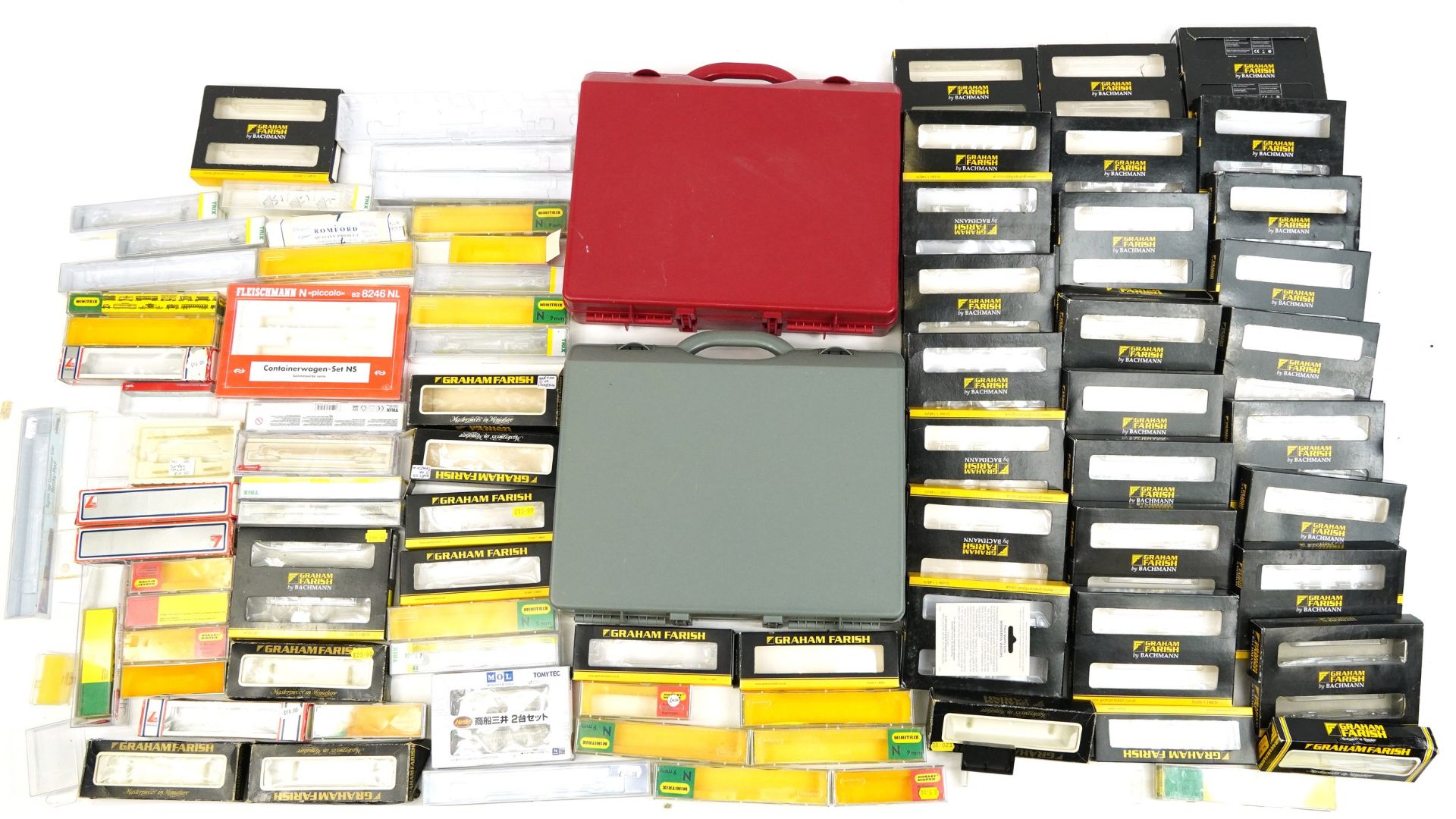 Large collection of N gauge model railway boxes and protective cases including Graham Farish,