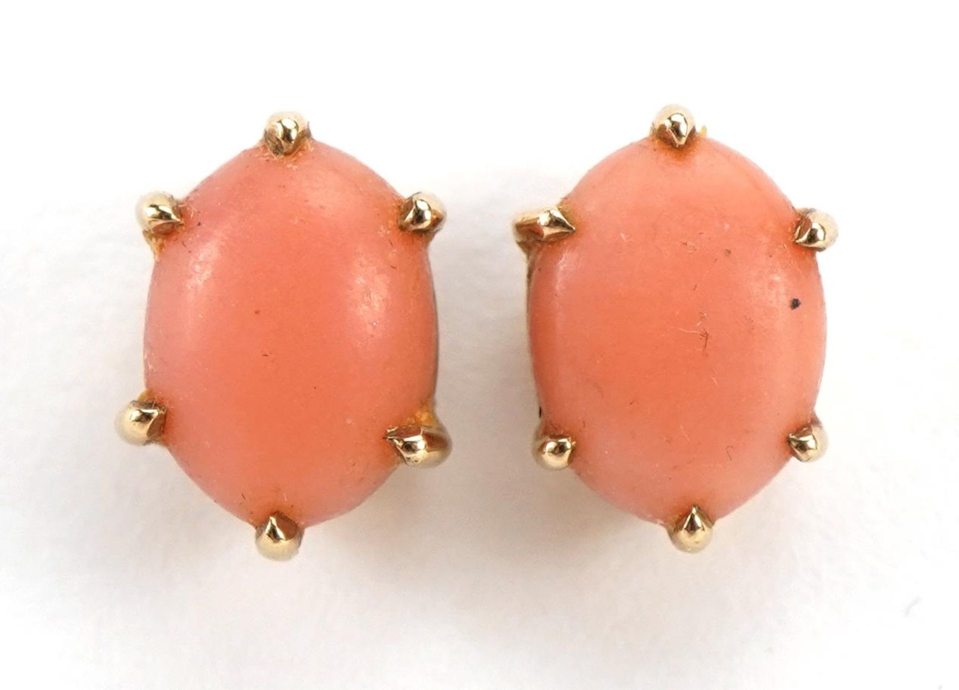 Pair of 9ct gold cabochon coral stud earrings, 9mm high, 1.9g