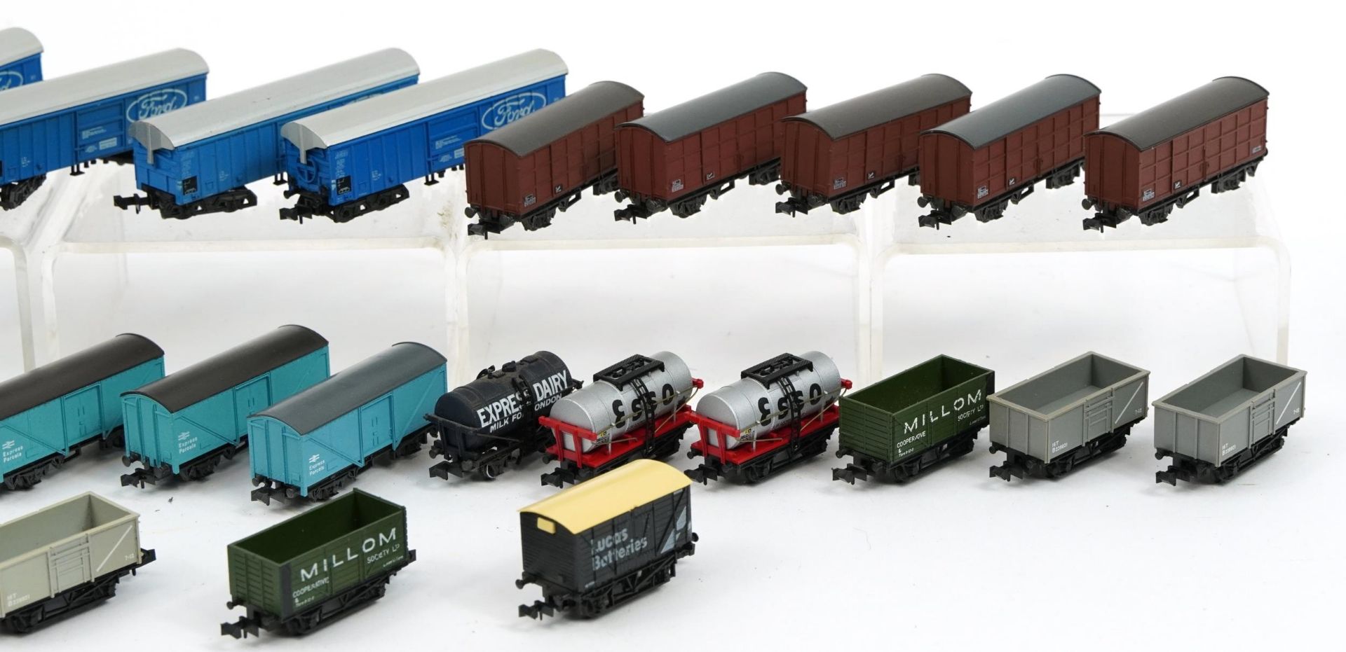 Twenty five N gauge model railway wagons and tankers including Peco and Trix, housed in two - Image 3 of 3