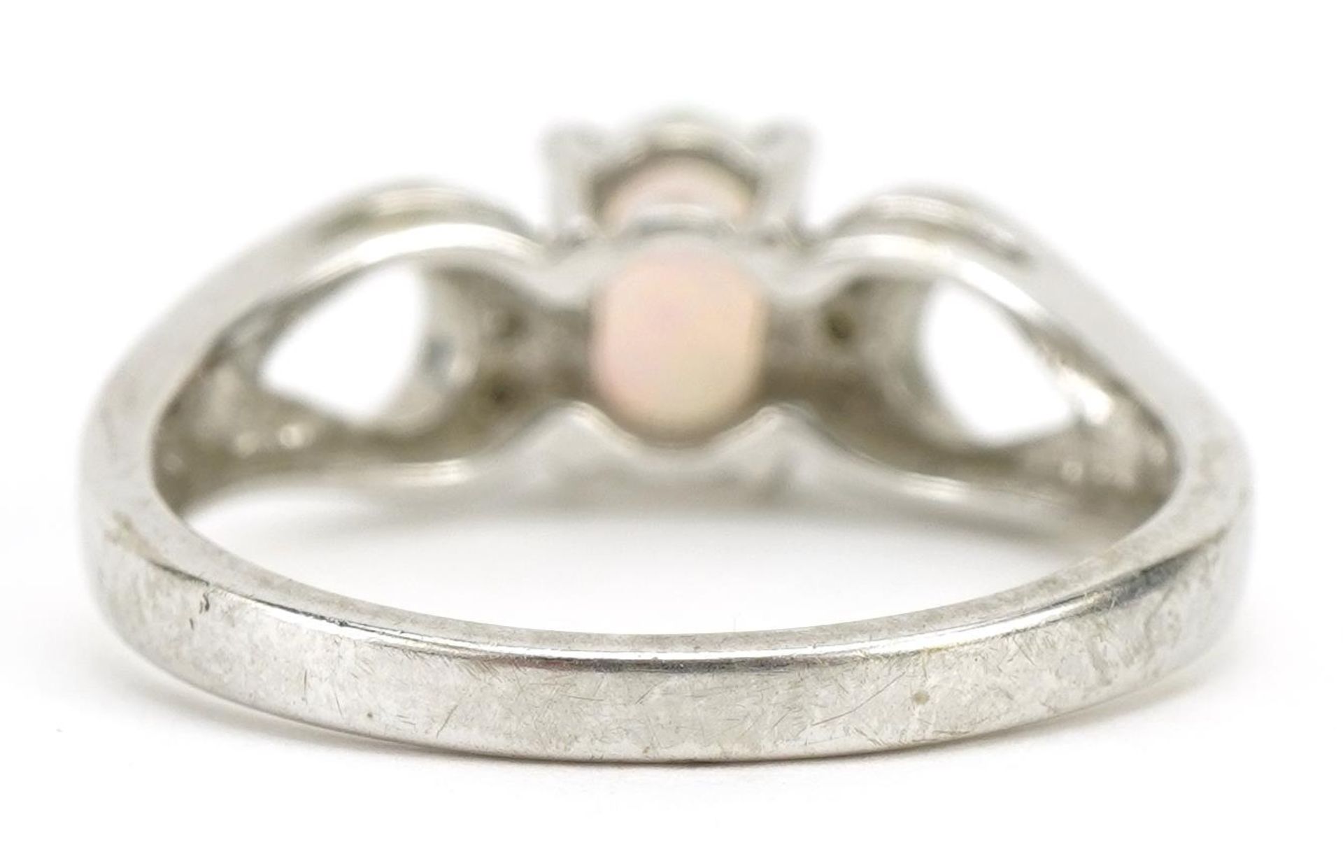 9ct white gold opal and diamond ring with split shoulders, the opal approximately 6.9mm x 4.9mm, - Image 2 of 3