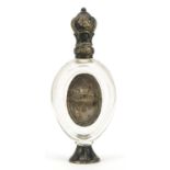 Antique cut glass scent bottle with stopper and unmarked silver mounts, 10.2cm high