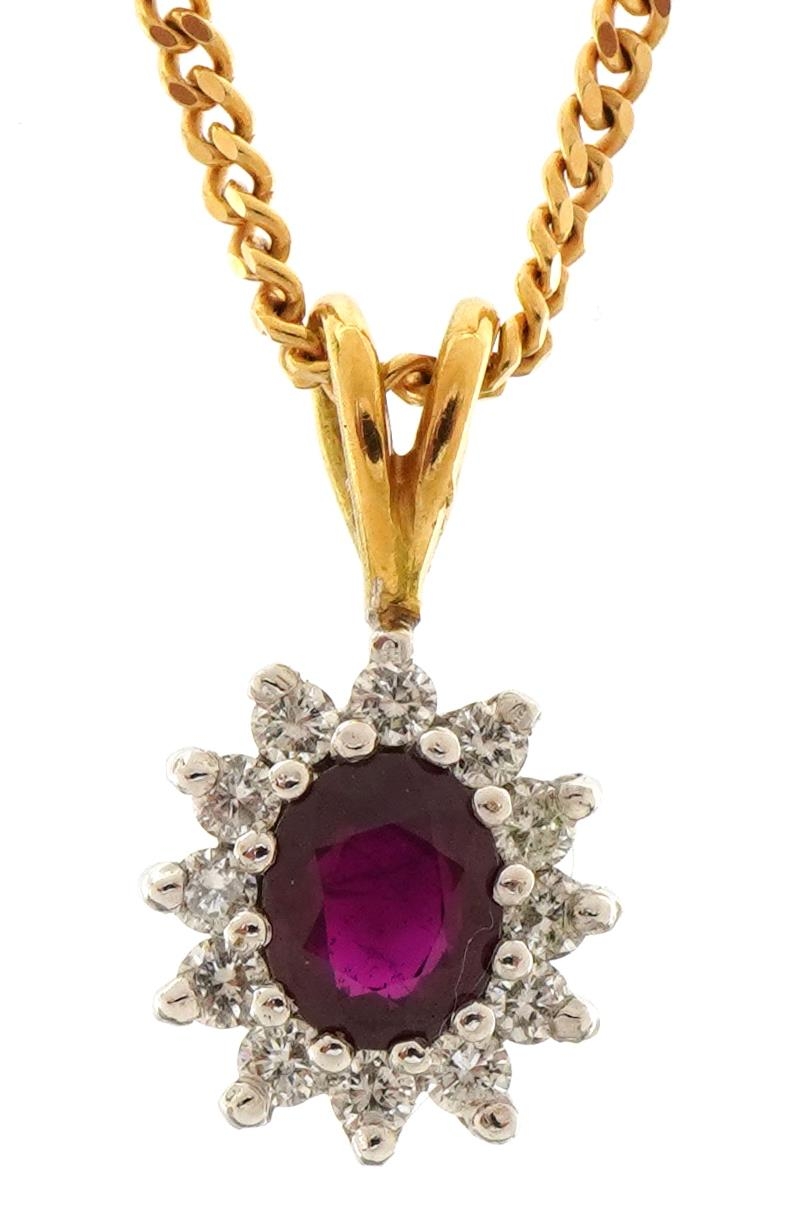 18ct gold ruby and diamond cluster pendant on a 9ct gold curb link necklace, 1.5cm high and 41cm