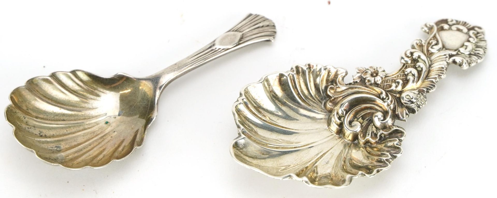 Two antique silver caddy spoons including a Victorian example, Sheffield 1859, the largest 9cm in