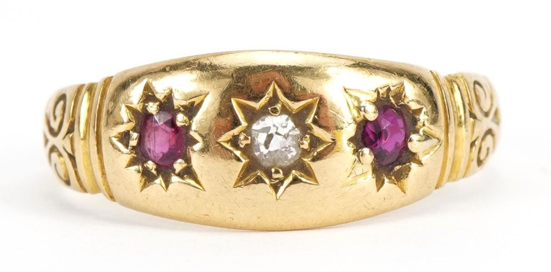 Victorian 18ct gold diamond and ruby three stone Gypsy ring with scrolled shoulders, size O, 3.0g