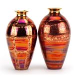 Atkinson Jones, two contemporary lustreware vases having red glazes, each 16.5cm high