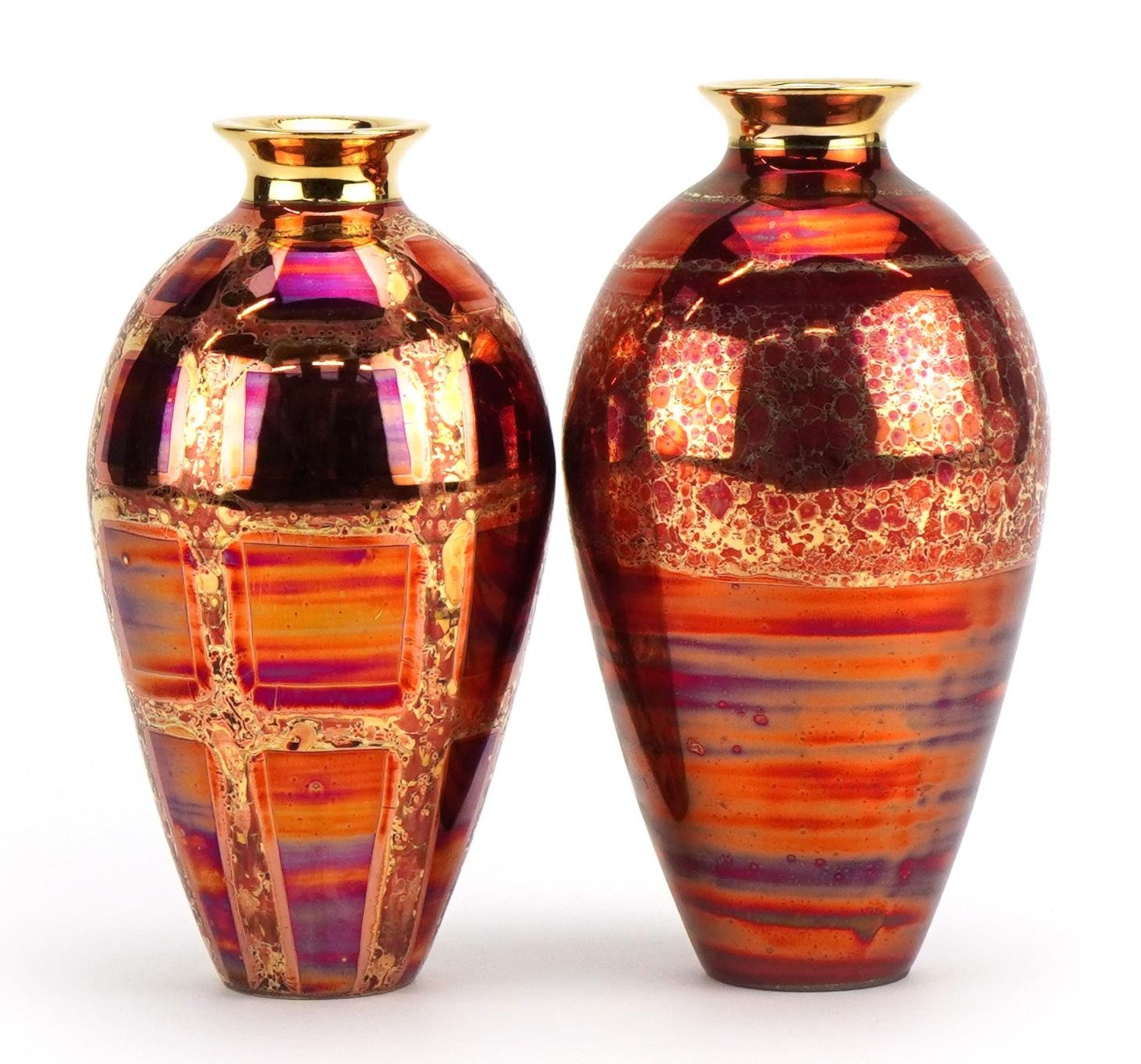 Atkinson Jones, two contemporary lustreware vases having red glazes, each 16.5cm high