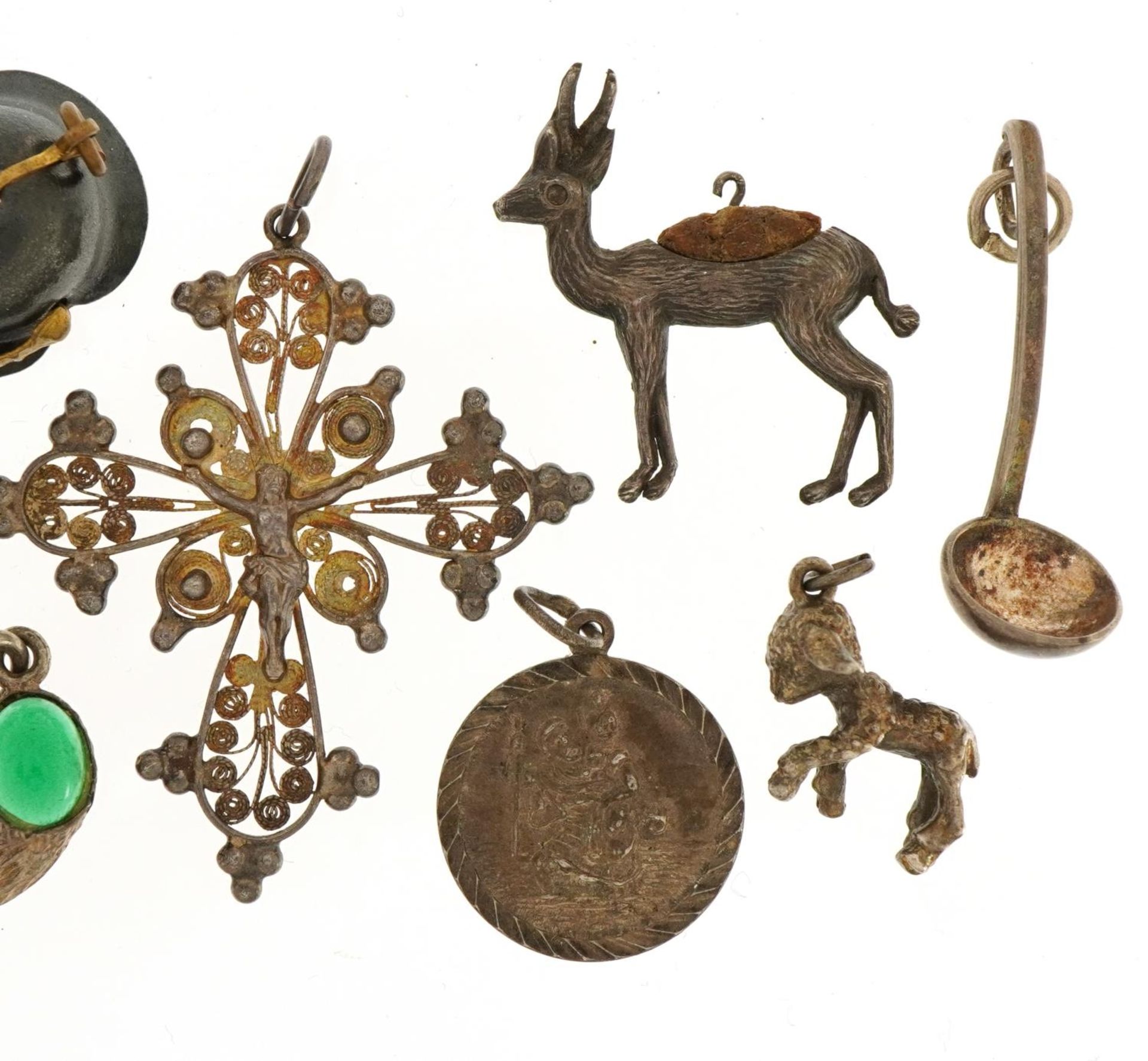 Collection of silver and white metal charms and pendants including a Pickelhaube helmet, crucifix - Image 3 of 4