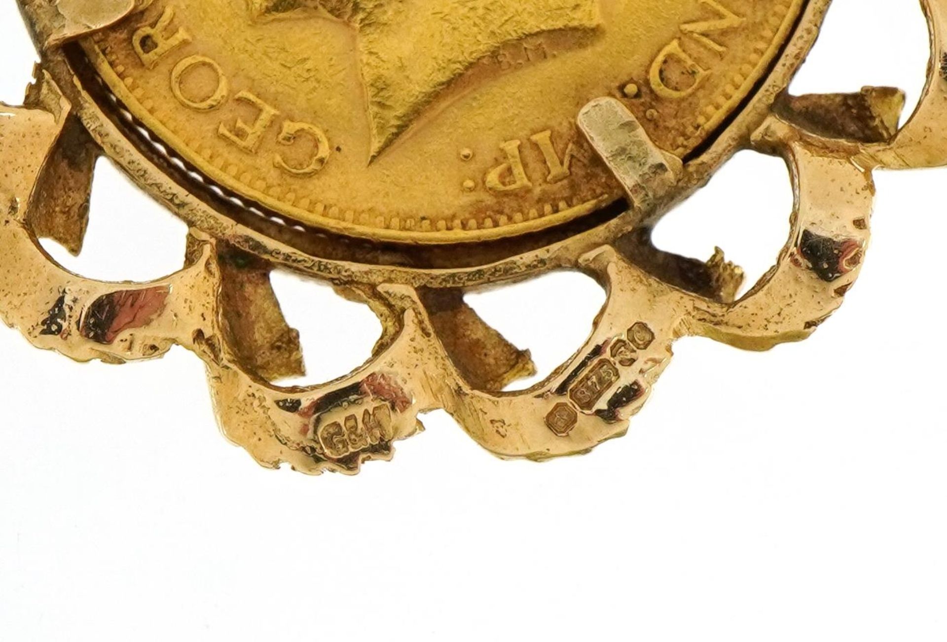 George V 1911 gold sovereign housed in a 9ct gold pendant mount, 4cm high, 12.7g - Image 3 of 3