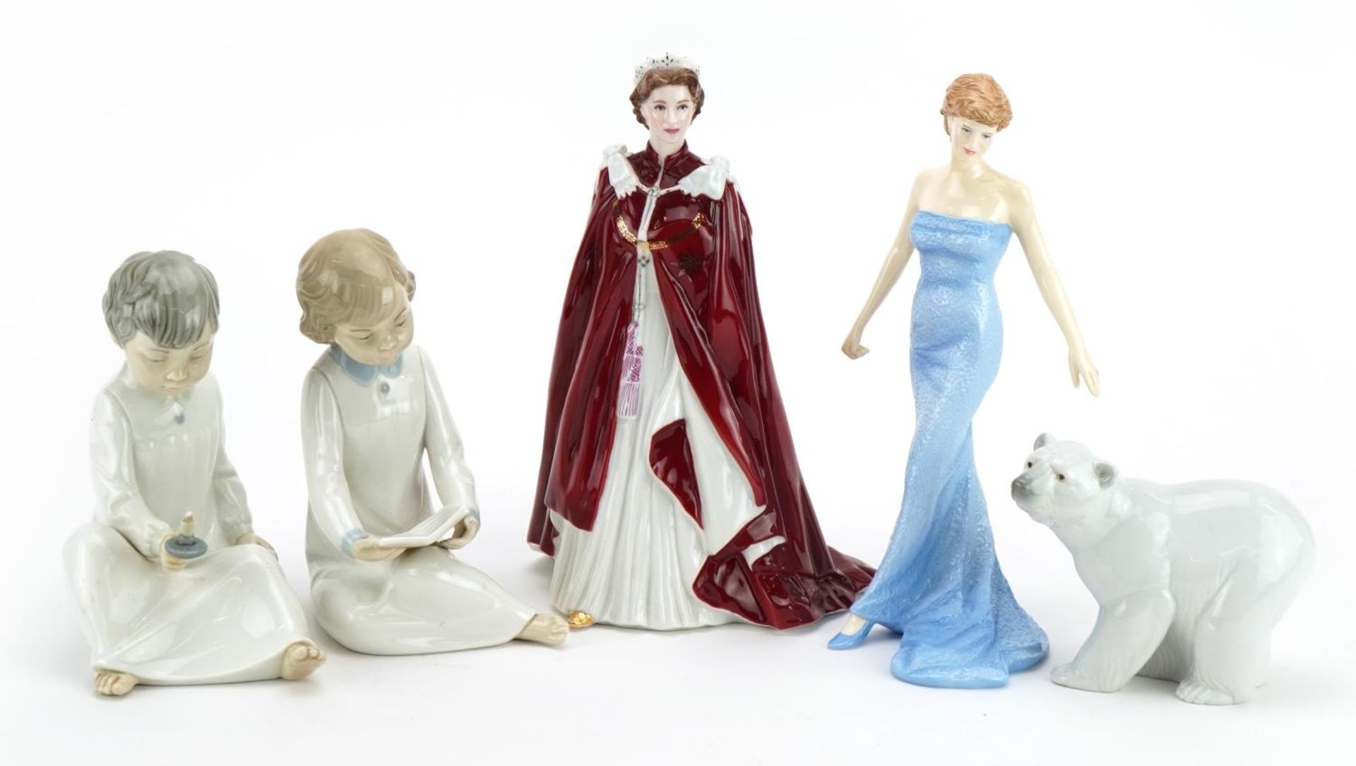 Collectable figures and a Lladro polar bear including Royal Worcester Queen Elizabeth II and Royal