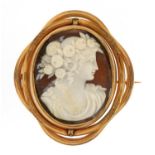 Antique yellow metal cameo mourning brooch with rotating centre housed in a H P Turner Waltham watch