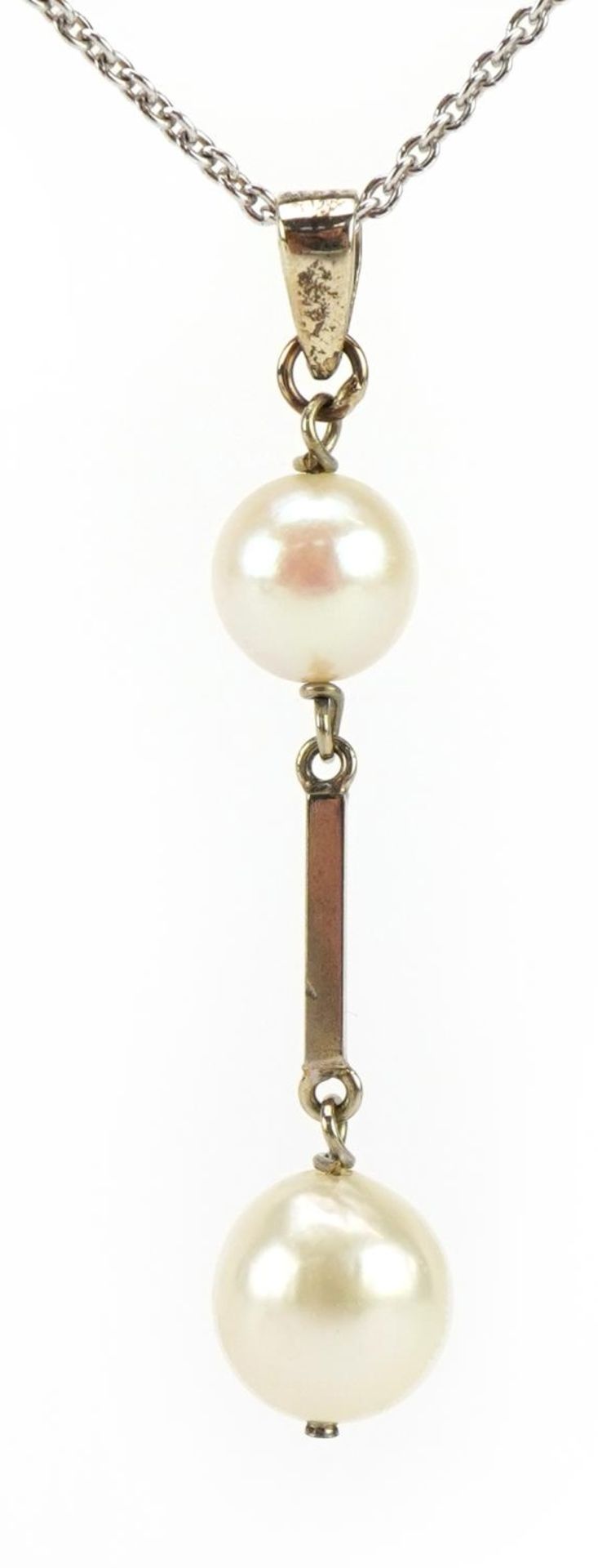 Unmarked white metal cultured pearl pendant on a 9ct white gold necklace, 3.7cm high and 40cm in