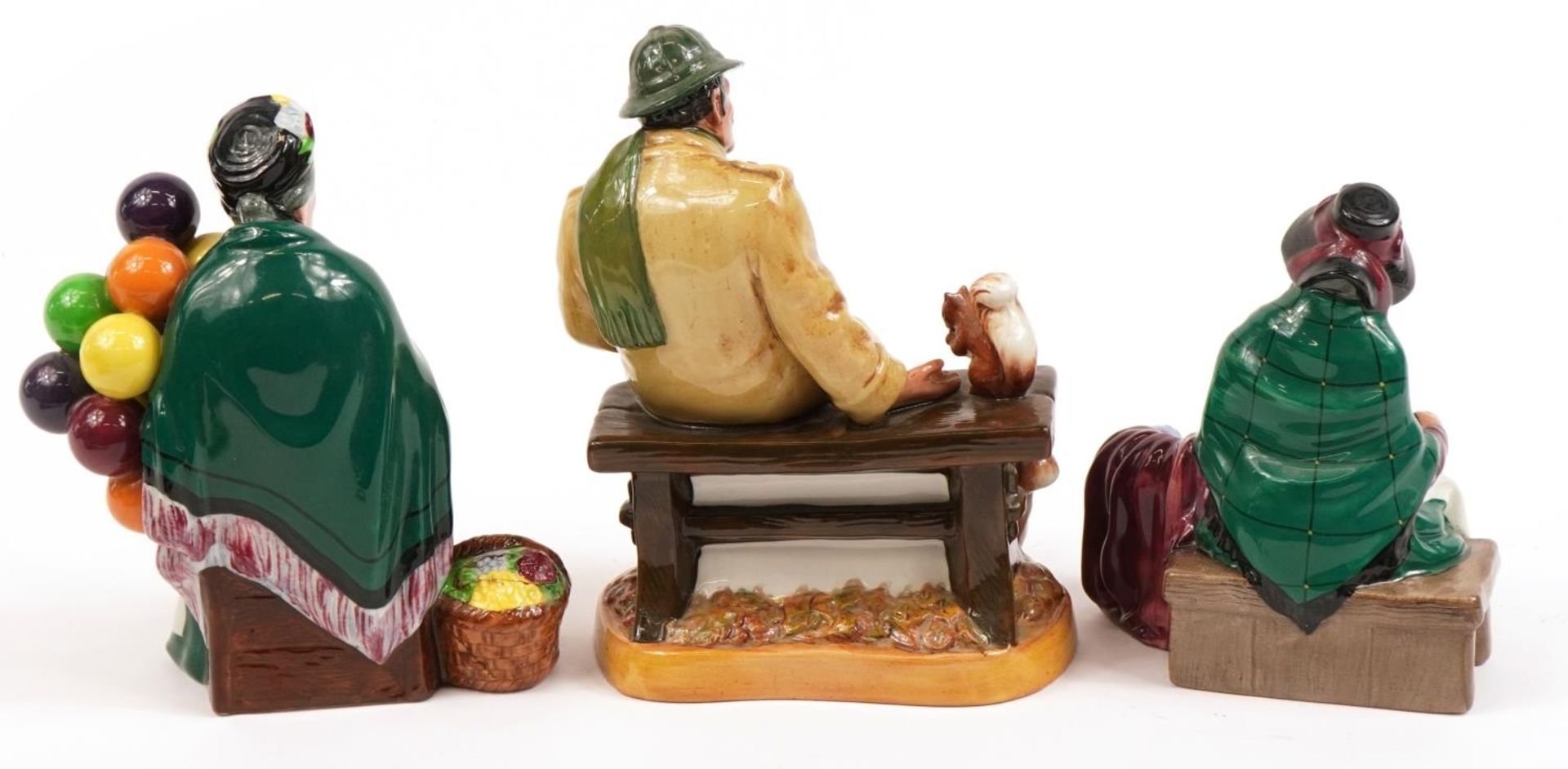 Three Royal Doulton figures comprising Lunchtime HN2485, The Old Balloon Seller HN1315 and Silks & - Image 2 of 4