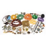 Vintage and later costume jewellery including a Trifari necklace, amber coloured bead necklaces,
