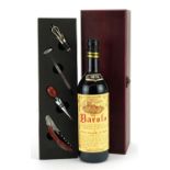 Bottle of 1970 Vino Barolo red wine with presentation box and accessories