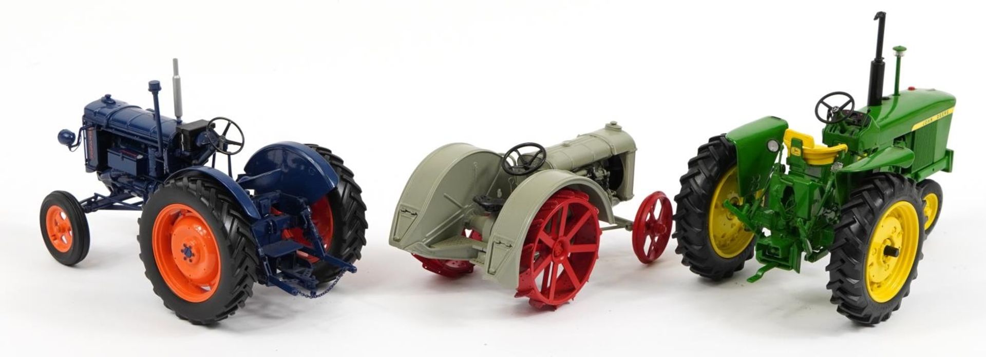 Three diecast model tractors, two with boxes comprising Universal Hobbies Fordson Major E27N, Ertl - Image 3 of 4