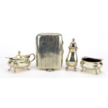 Adie Brothers Ltd, silver three piece cruet set with blue glass liners and a rectangular silver