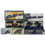 Five Corgi diecast collector's vehicles with boxes including Heavy Haulage, Pickfords and Guinness