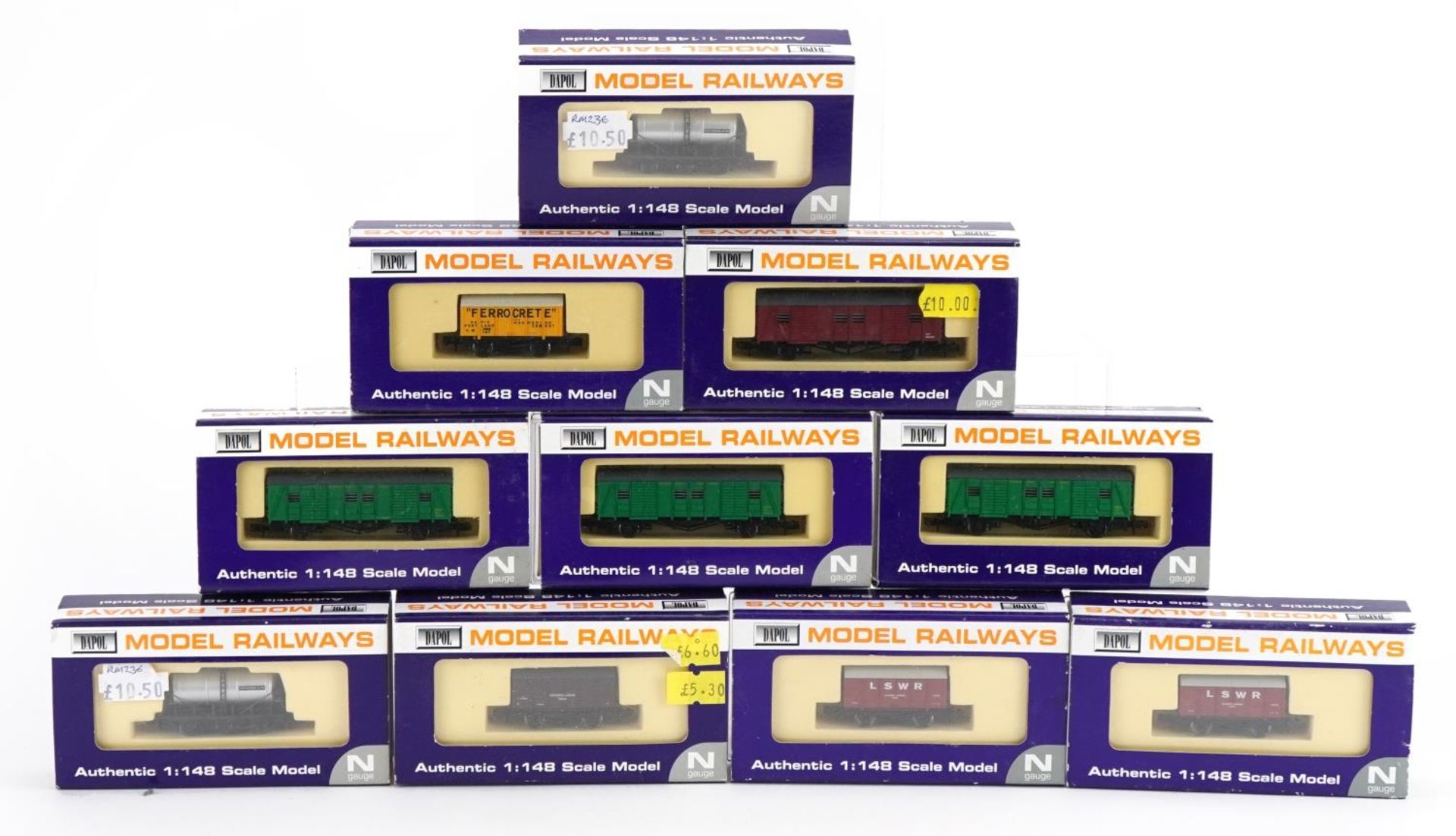 Ten Dapol N gauge model railway tankers and wagons with cases, numbers NB009, NB014, NB016, NB016,