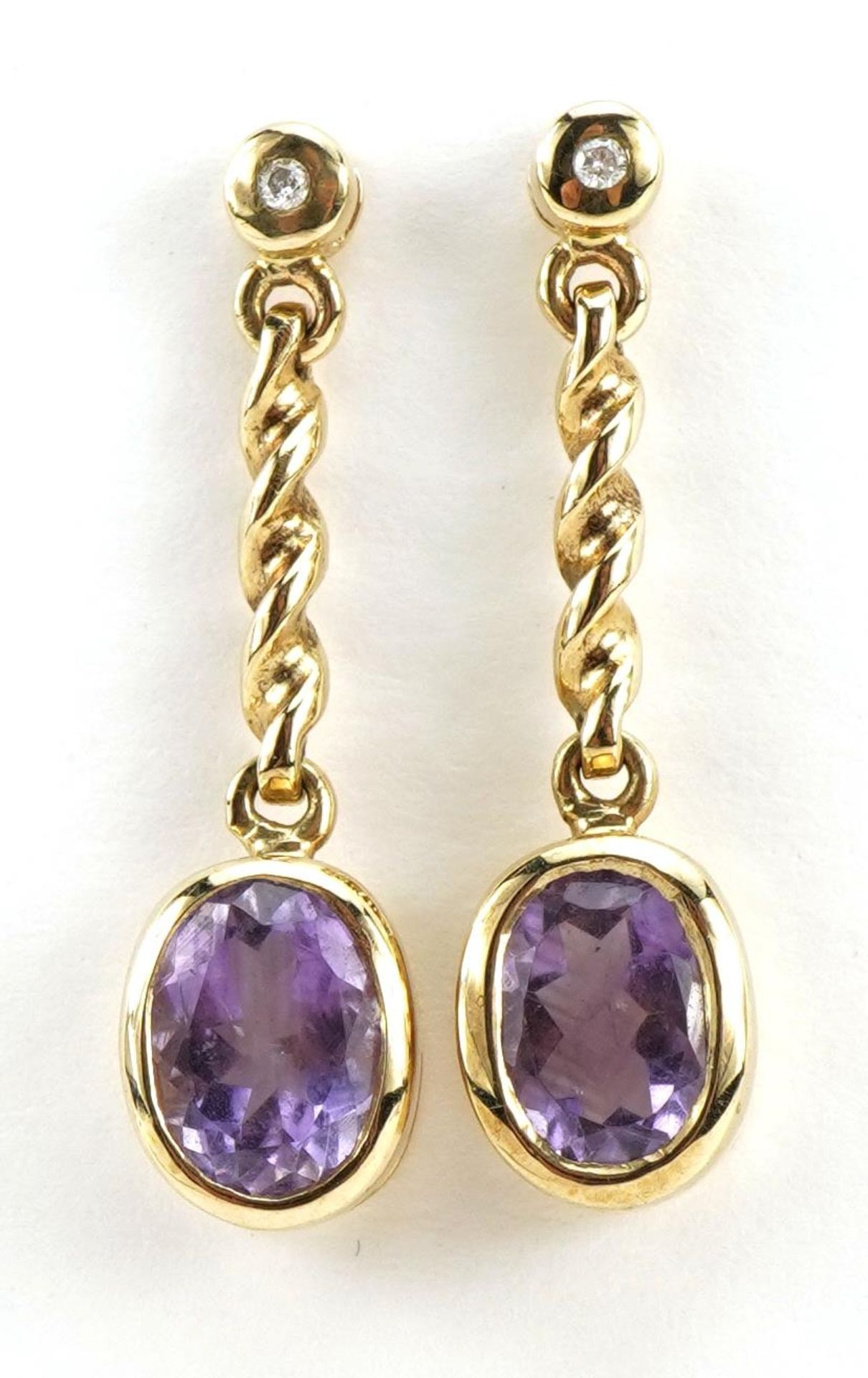 Pair of 9ct gold diamond and amethyst rope twist drop earrings, 2.9cm high, 3.7g